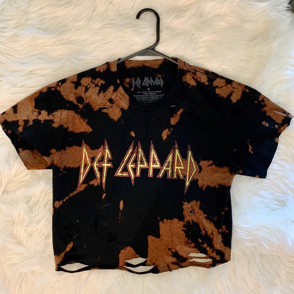 Cropped and distressed band T